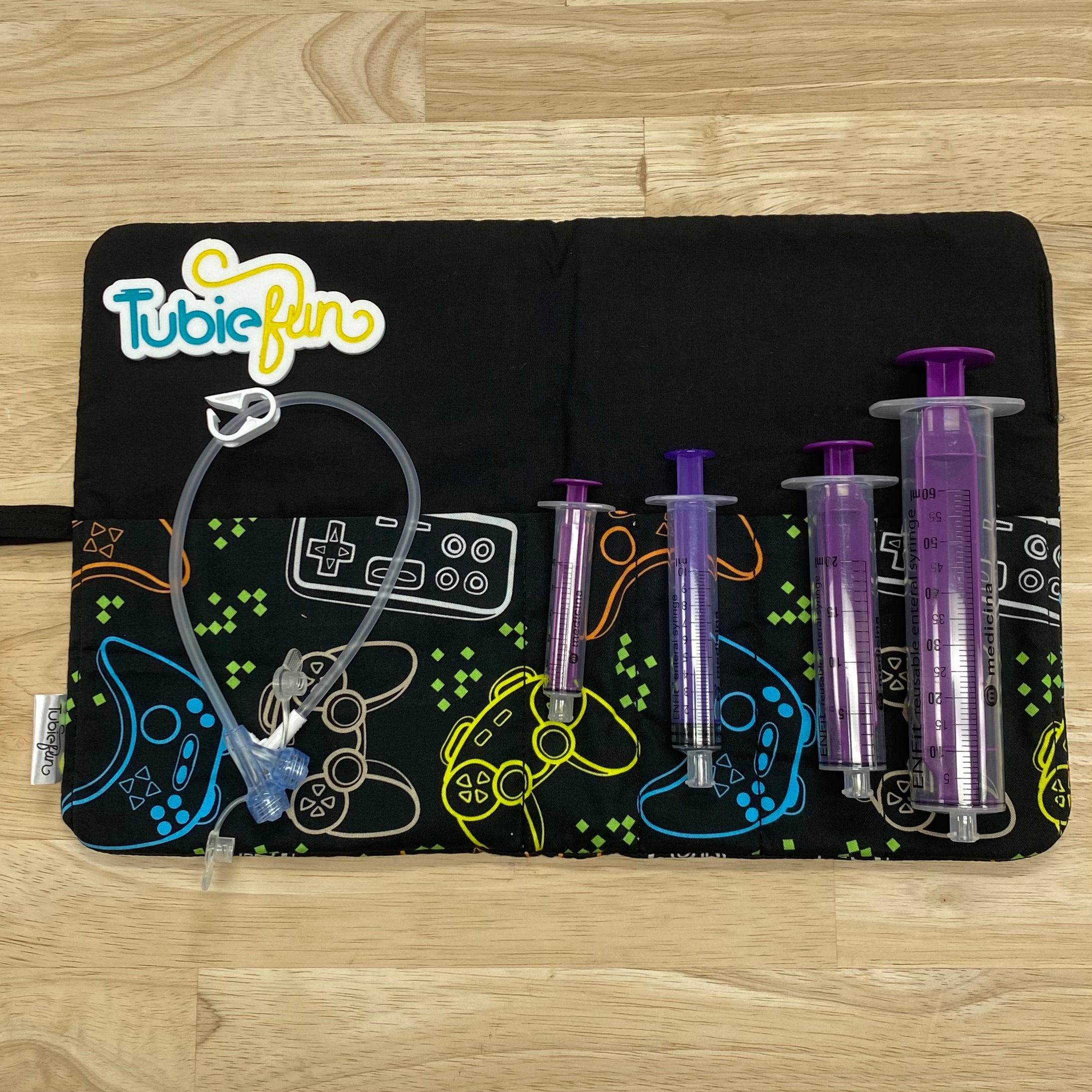 Syringe Roll Game Controllers on Black Tubie Fun