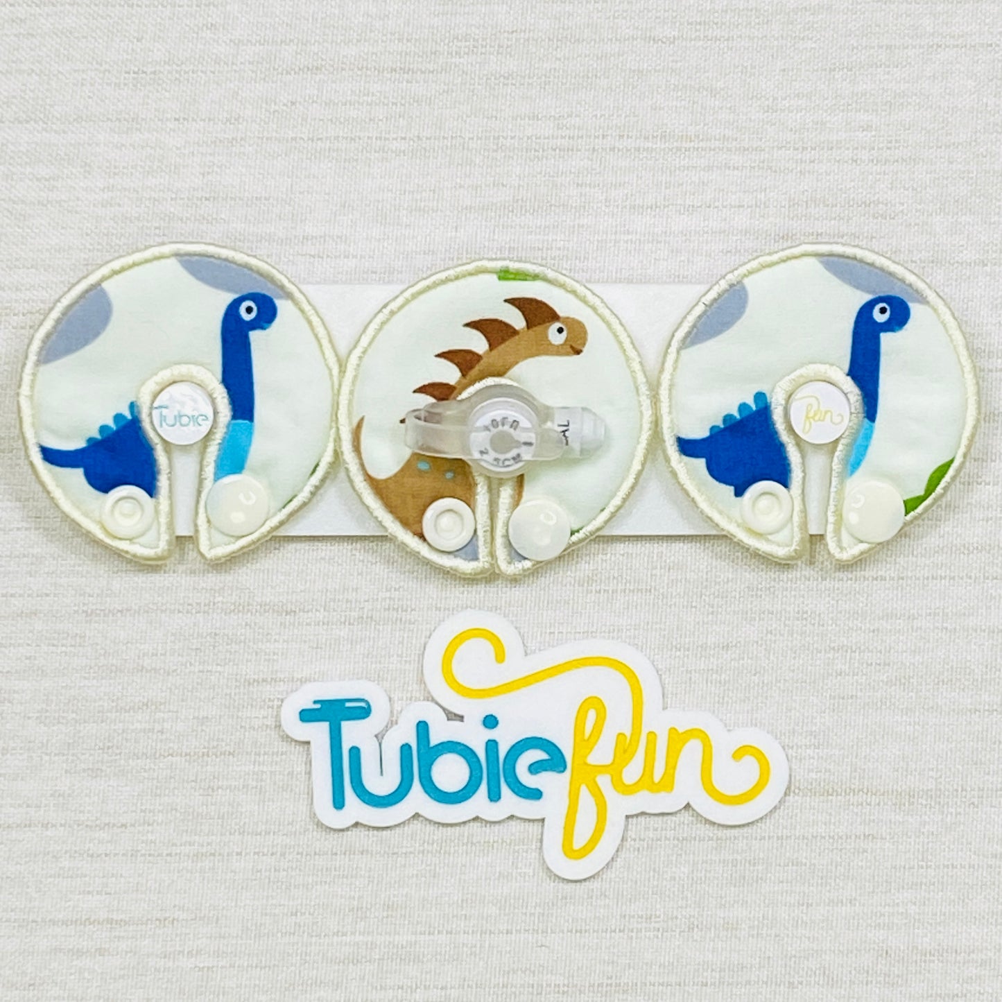 G-Tube Button Pad Cover - Coloured Dinosaurs on Cream