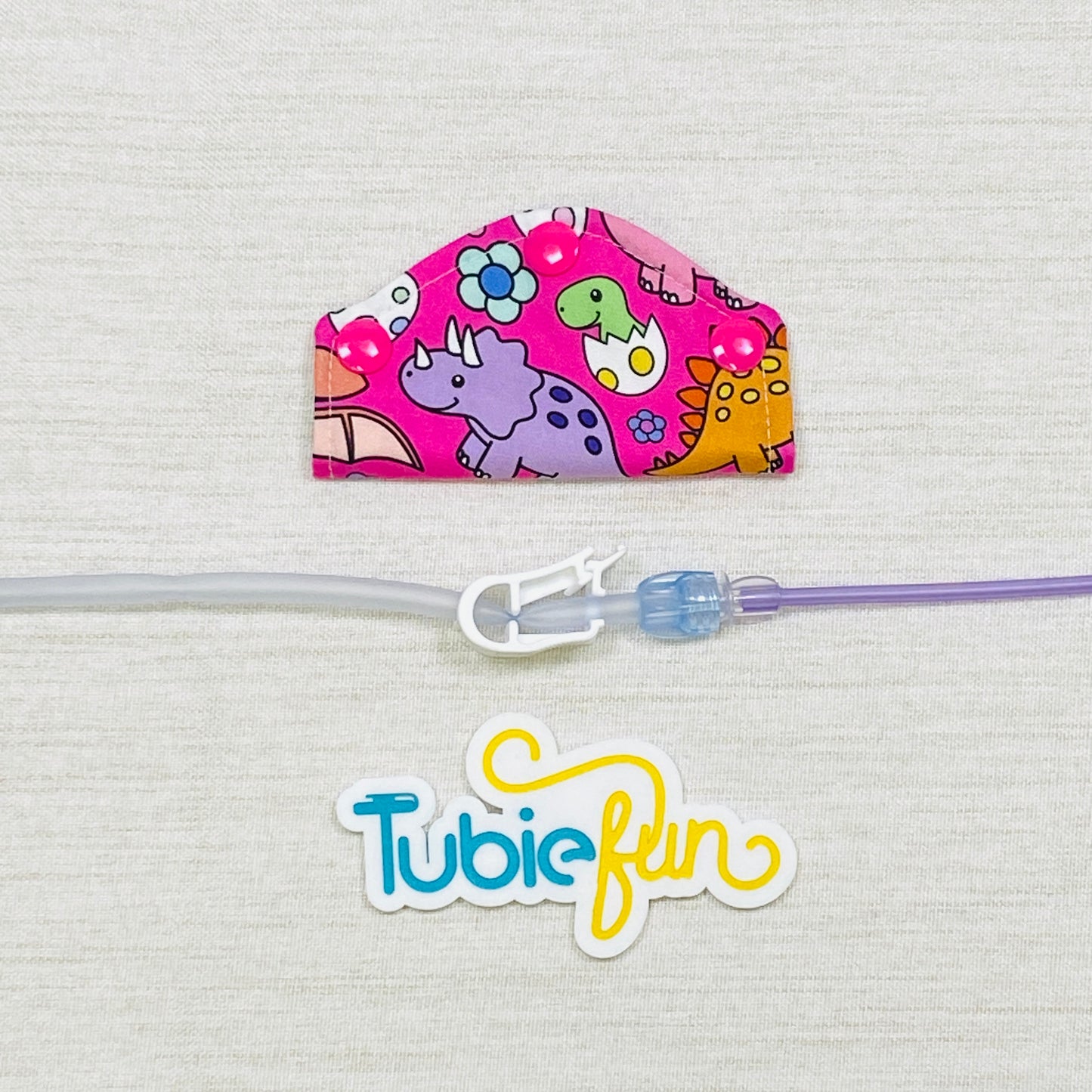 Feeding Tube Mini Connection Cover - Coloured Dinosaurs on Pink