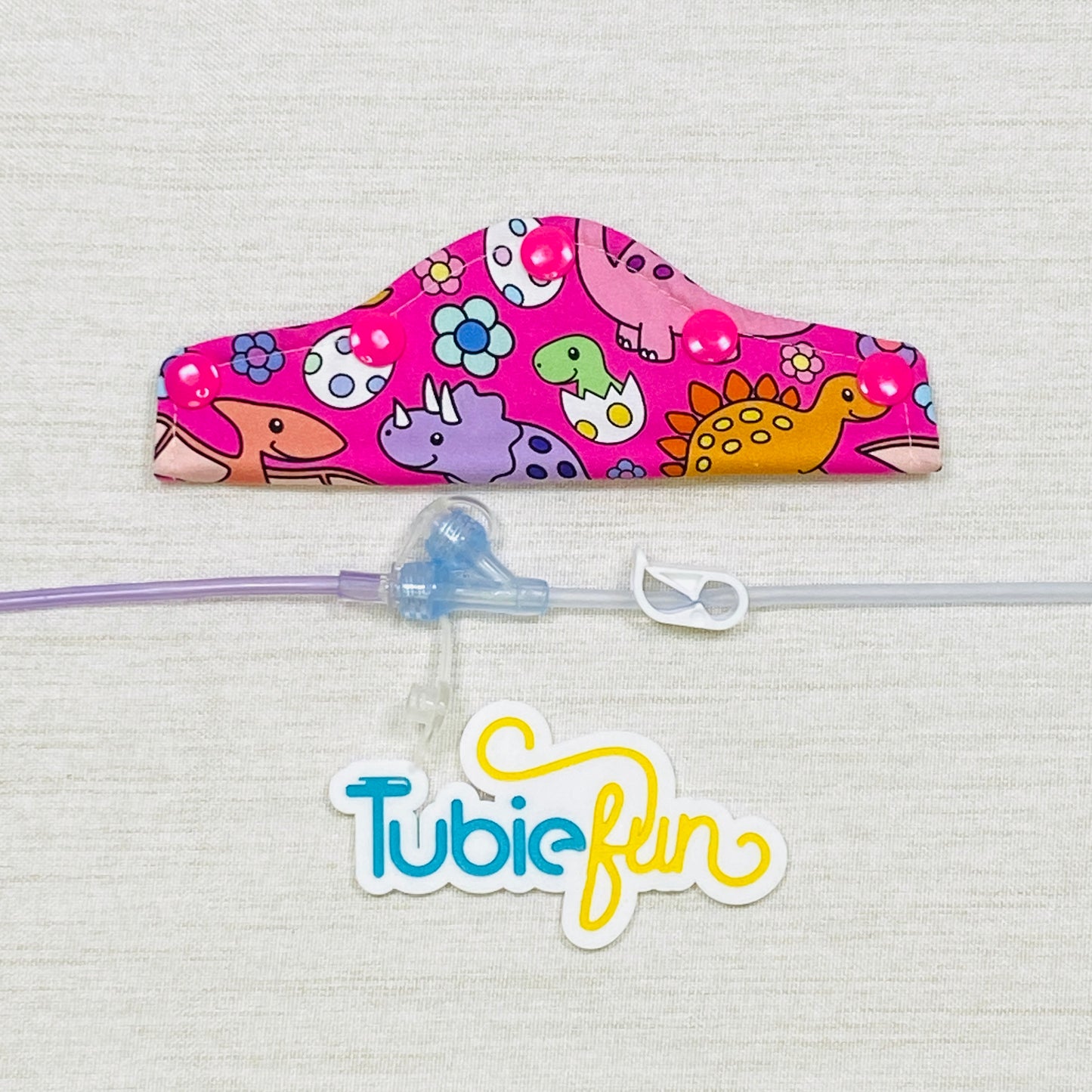 Feeding Tube Connection Cover - Coloured Dinosaurs on Pink