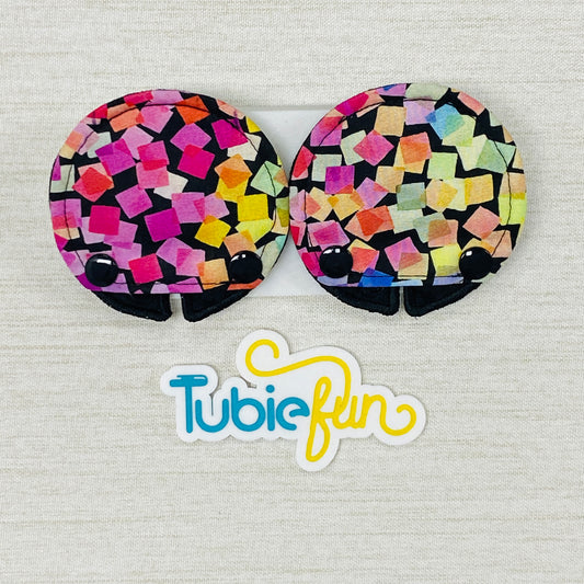 Covered Button Pad - Coloured Shapes on Black