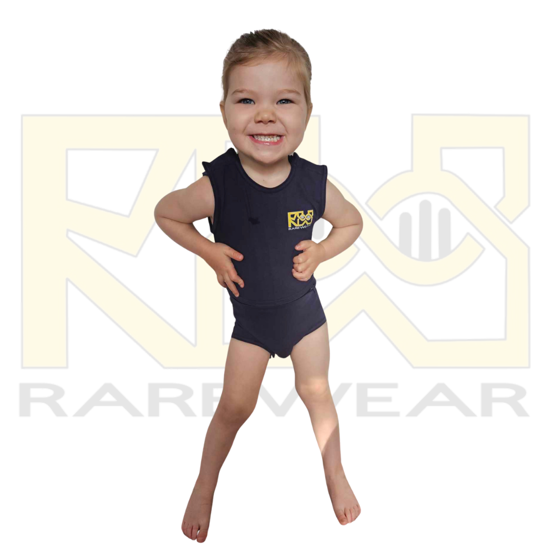 White OneEase Adaptive Onesie – lifestyle