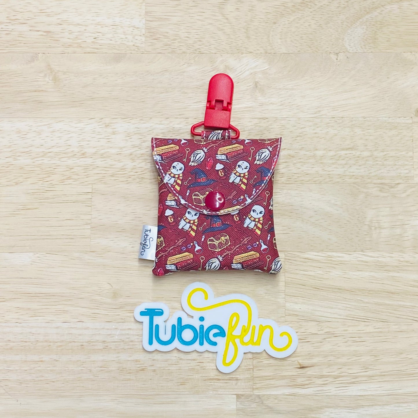Tubing Pouch - Wizard Boy Items on Red